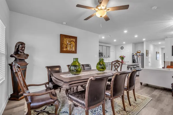 a view of a dining room with furniture