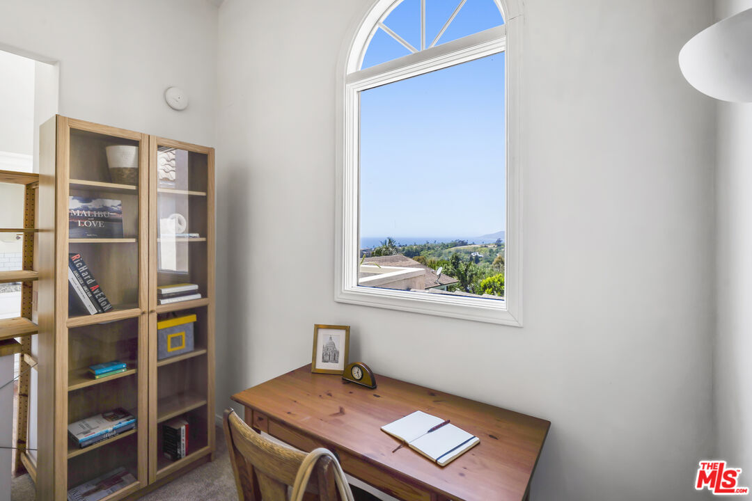 29355 Heathercliff Road, Unit GUESTHOUSE Malibu, CA 90265 - Photo 10 of 26 a view of a workspace with furniture