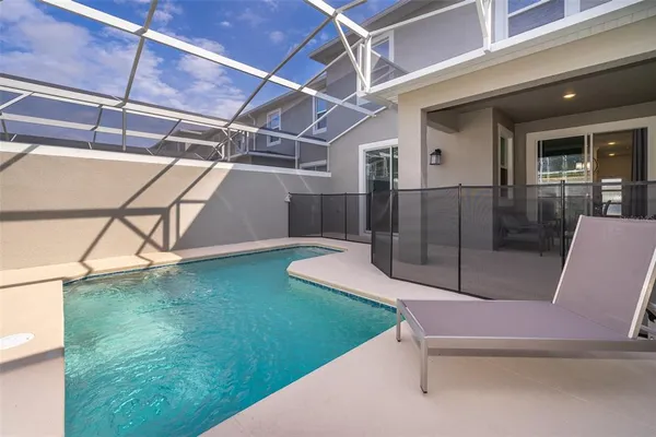 a view of yard with a table and chairs