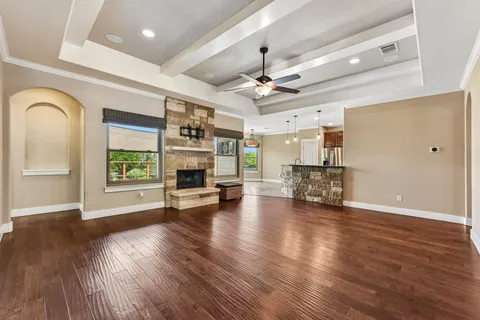 a view of a livingroom with furniture and a fireplace