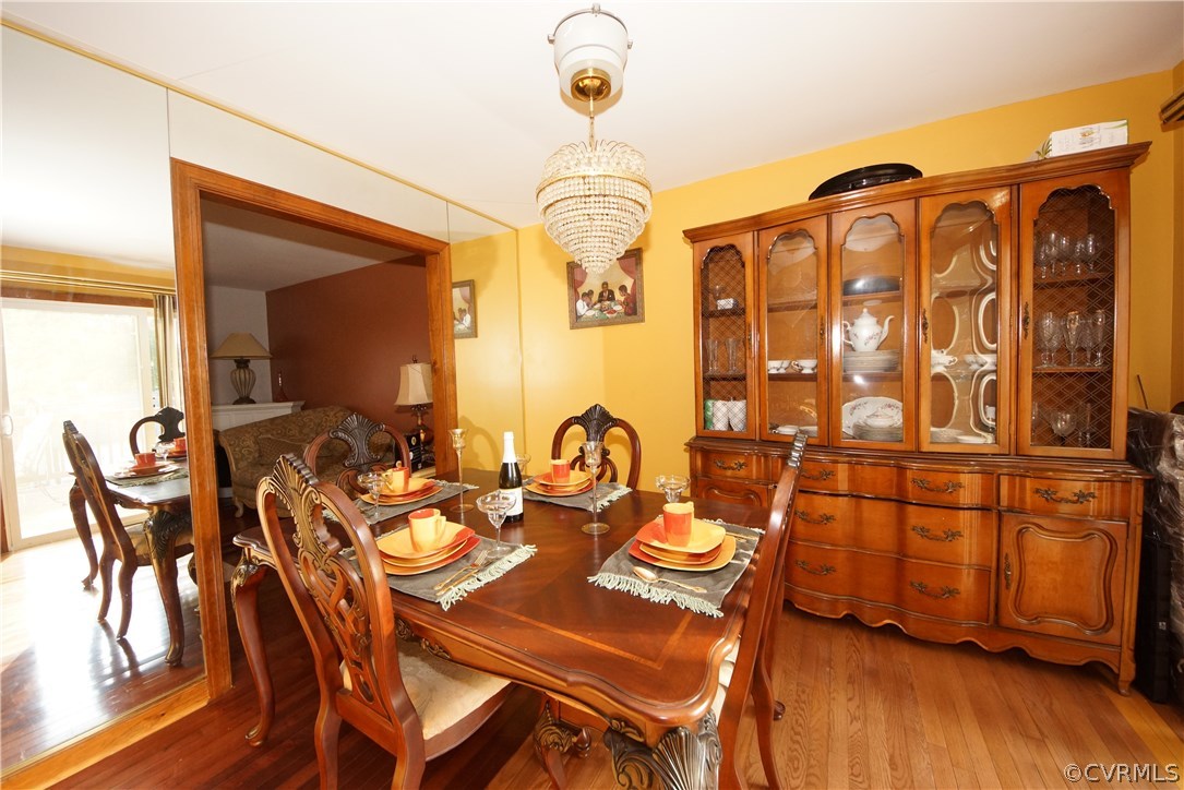 6320 Barrister Road Chesterfield, VA 23832 - Photo 4 of 22 a dining room with furniture and wooden floor