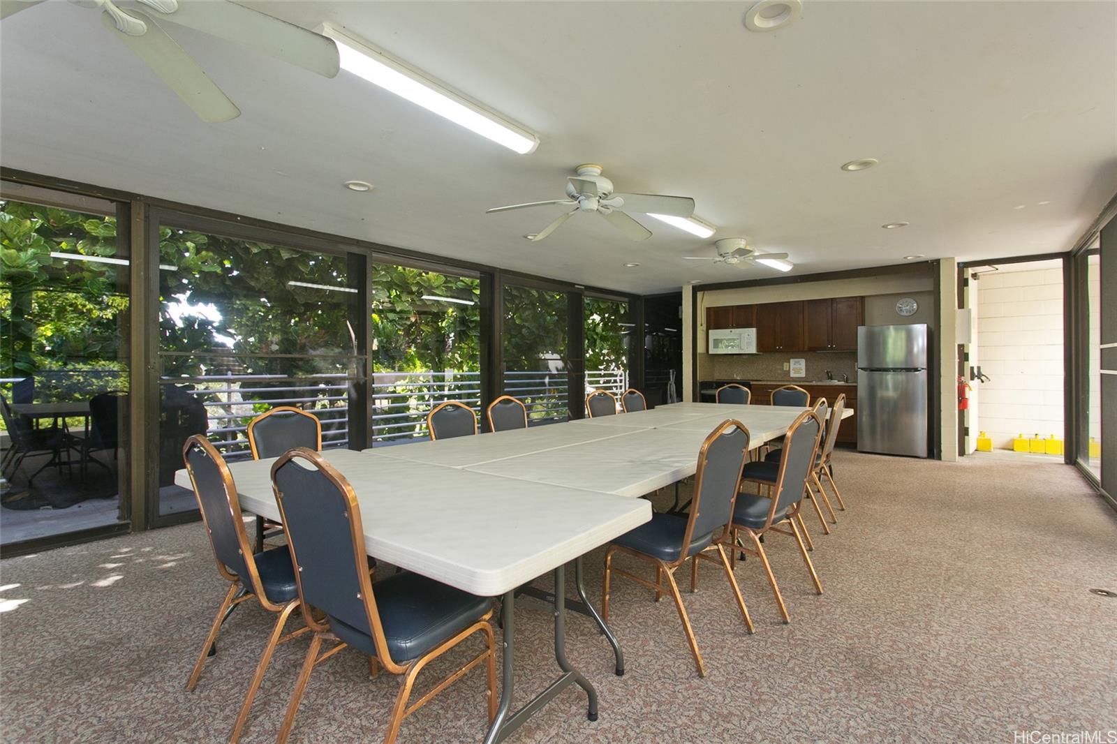3138 Waialae Avenue, Unit 330 Honolulu, HI 96816 - Photo 13 of 17 a view of a dining room with furniture window and outside view