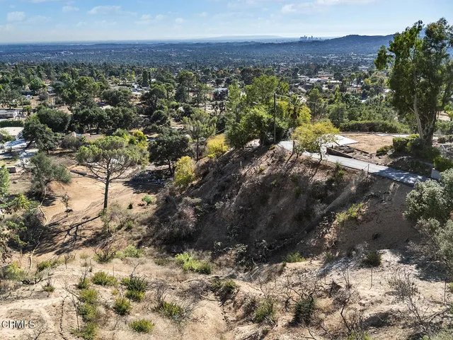 a view of a houses with a mountain