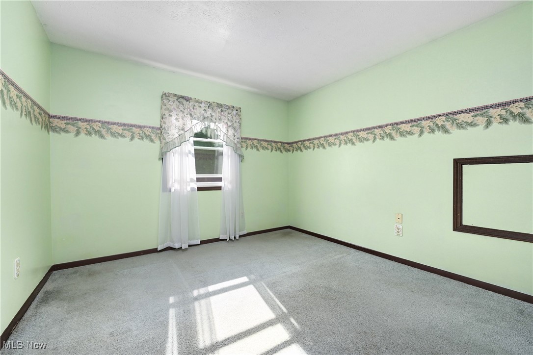 1820 Claus Road Vermilion, OH 44089 - Photo 7 of 10 View of carpeted spare room