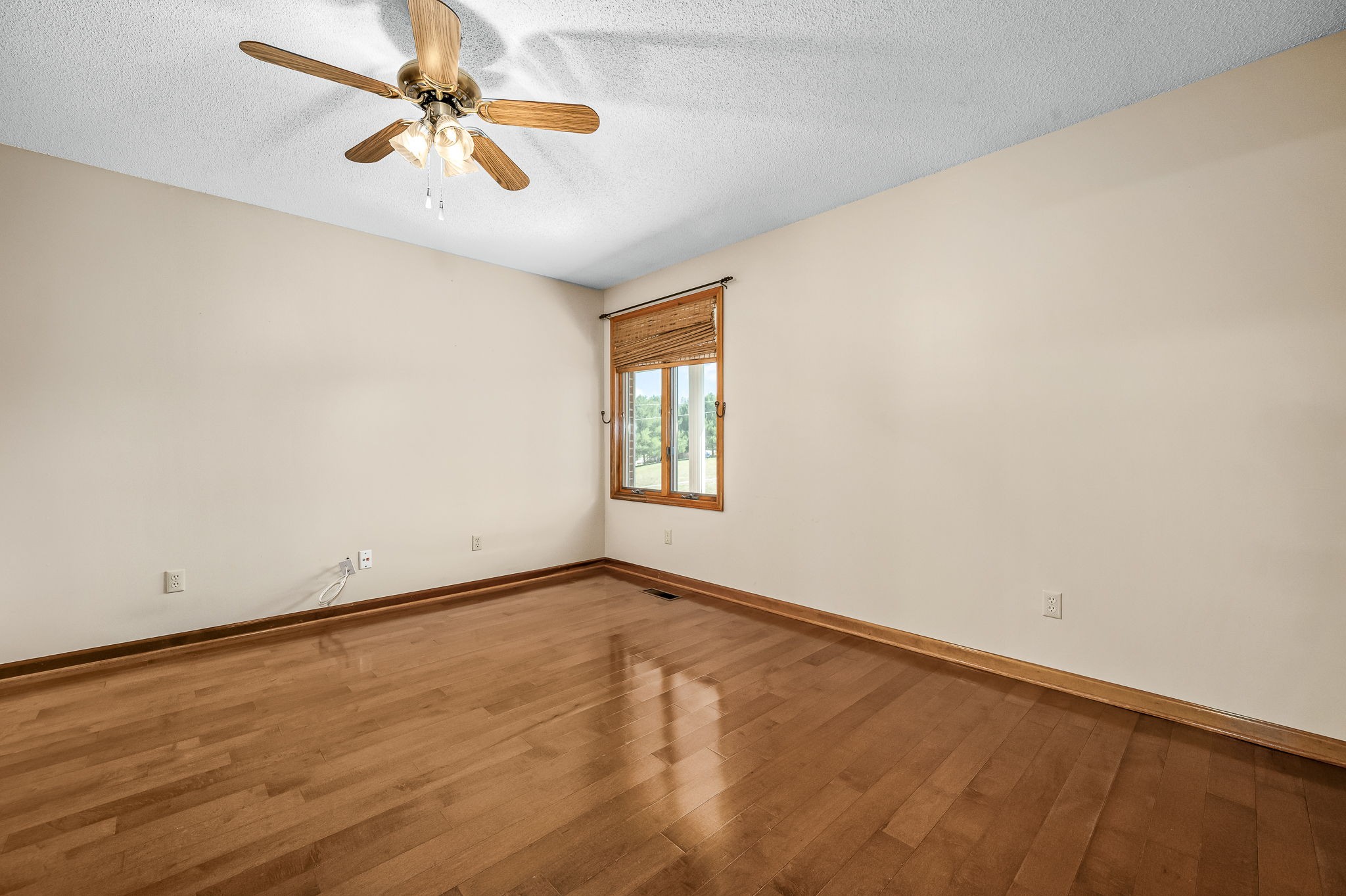 1246 Oakwood Road Joelton, TN 37080 - Photo 14 of 61 an empty room with a window and a ceiling fan