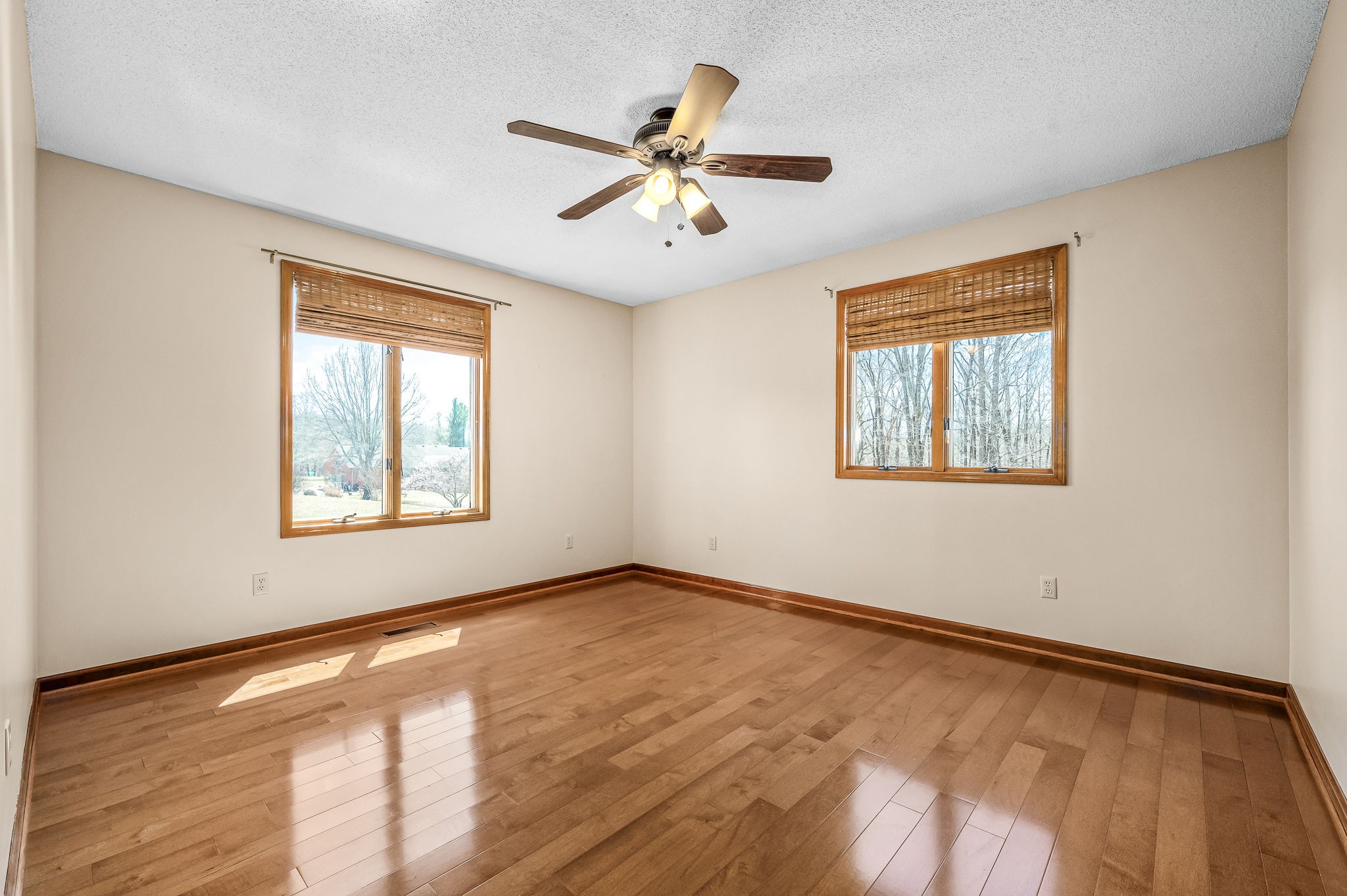 1246 Oakwood Road Joelton, TN 37080 - Photo 16 of 61 a view of an empty room with wooden floor and a window