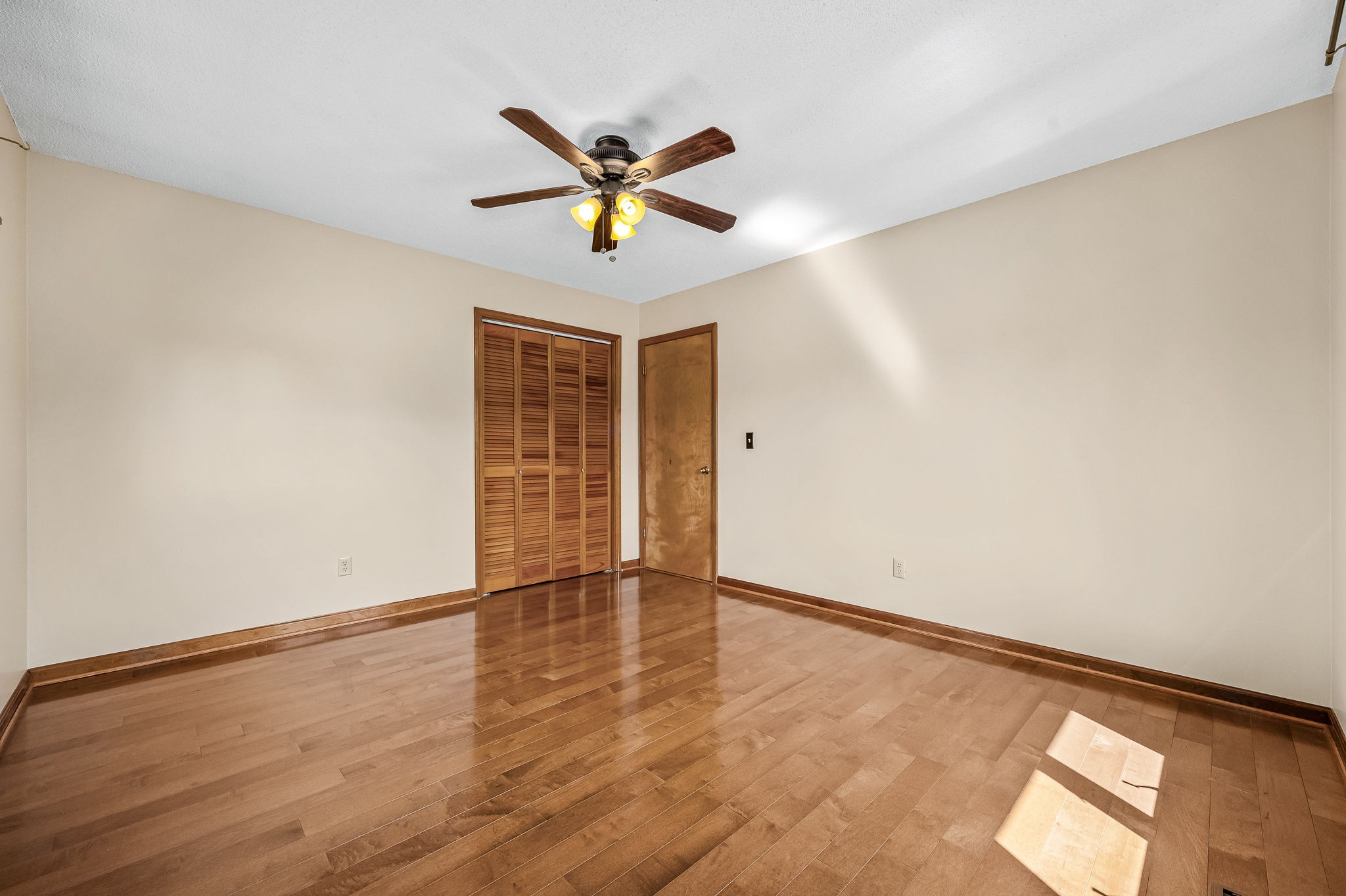 1246 Oakwood Road Joelton, TN 37080 - Photo 17 of 61 a view of empty room with wooden floor and fan