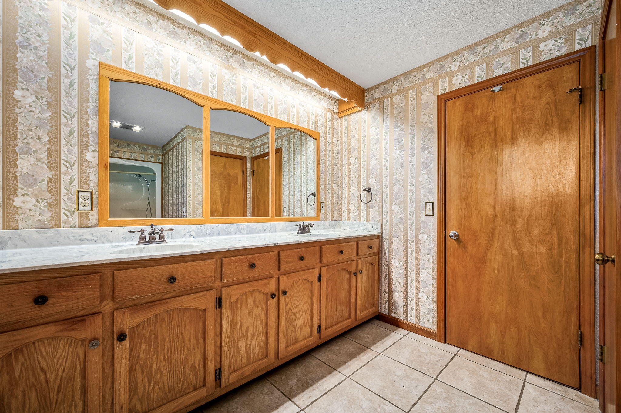 1246 Oakwood Road Joelton, TN 37080 - Photo 25 of 61 a bathroom with a granite countertop sink mirror and a shower