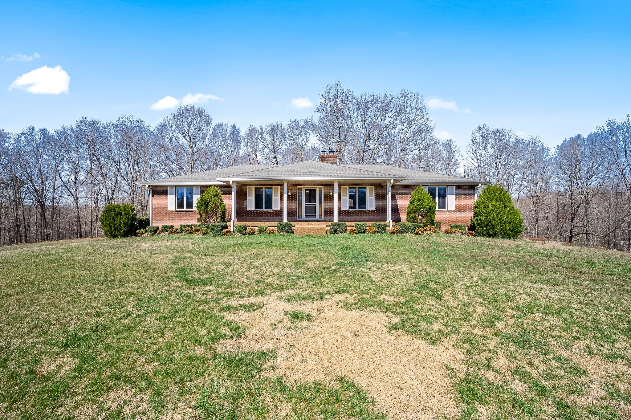 1246 Oakwood Road Joelton, TN 37080 - Photo 38 of 61 a front view of house with yard and trees around