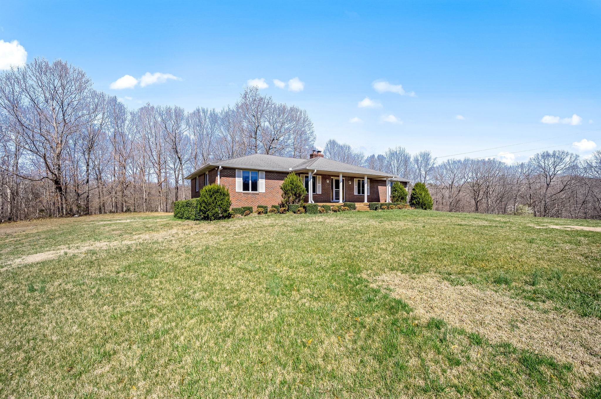 1246 Oakwood Road Joelton, TN 37080 - Photo 39 of 61 a view of house with garden and tall trees