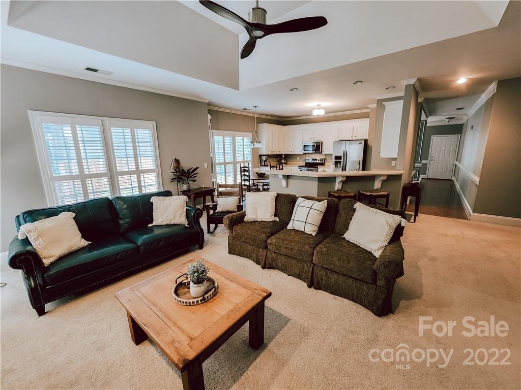 8408 Forest Shadow Circle Cornelius, NC 28031 - Photo 8 of 24 a living room with furniture and a window