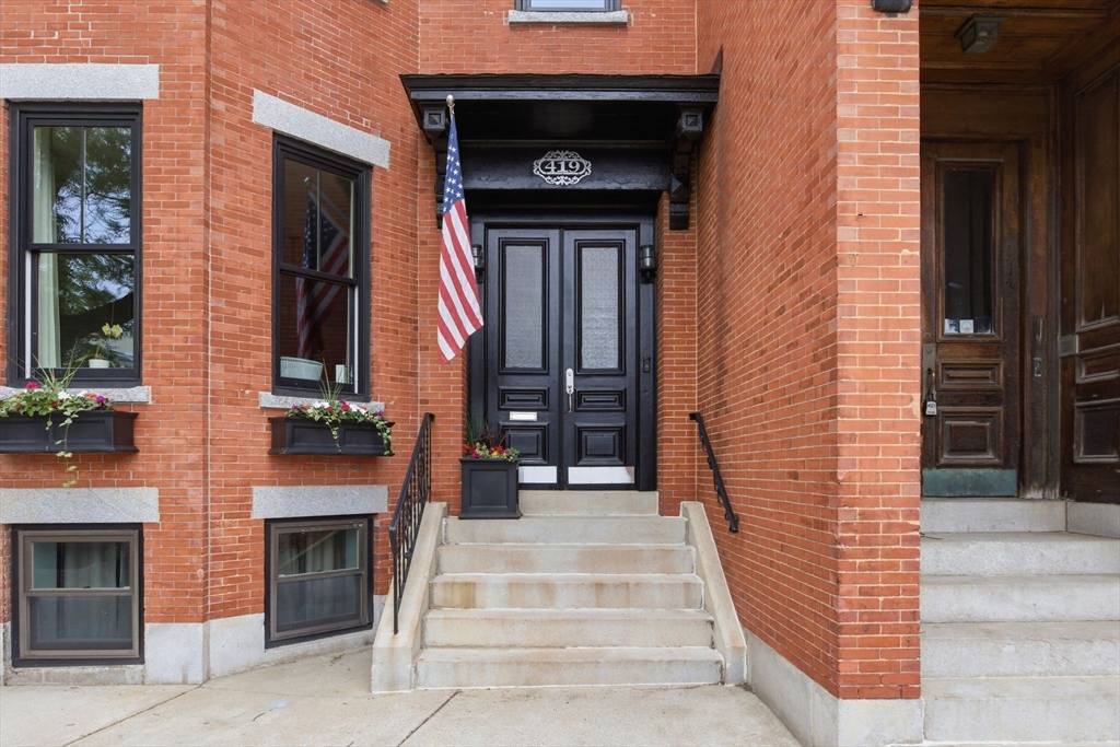 419 Main Street Boston, MA 02129 - Photo 2 of 41 a front view of a house with a stairs