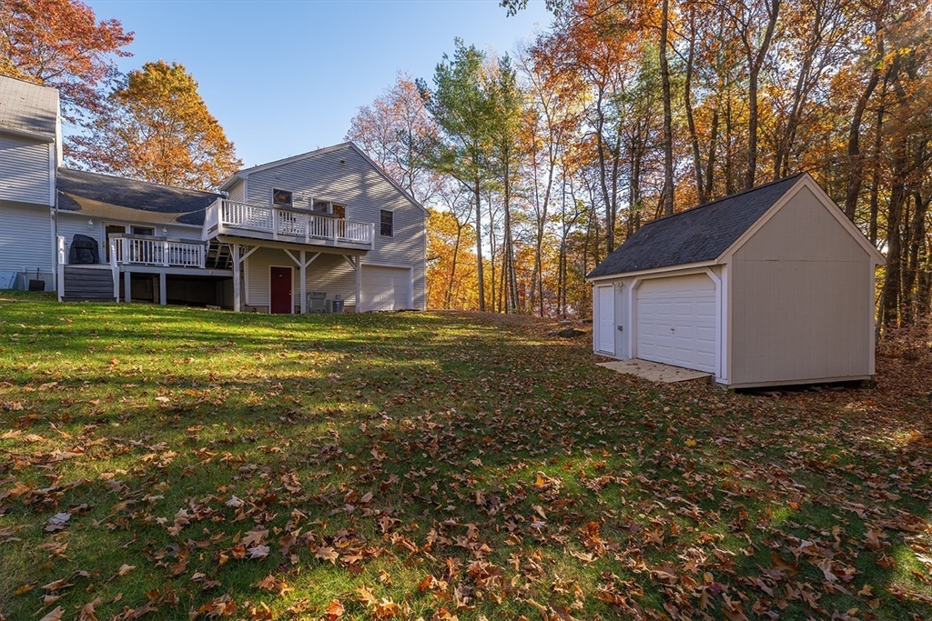 46 Long Pond Road Tyngsborough, MA 01879 - Photo 11 of 41 a house view with a garden space