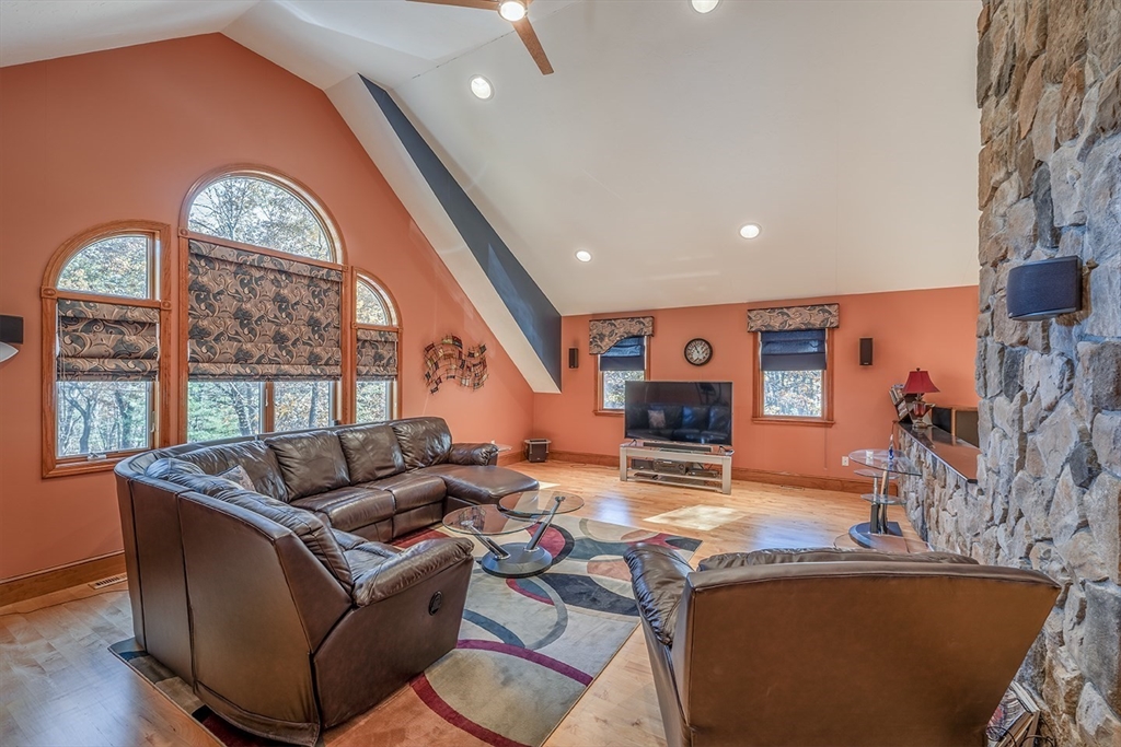 46 Long Pond Road Tyngsborough, MA 01879 - Photo 28 of 41 a living room with furniture and a large window