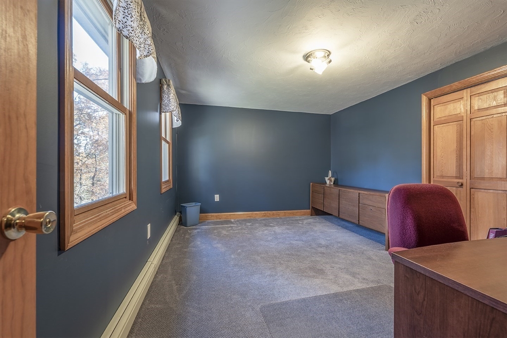 46 Long Pond Road Tyngsborough, MA 01879 - Photo 33 of 41 a view of an empty room with a window