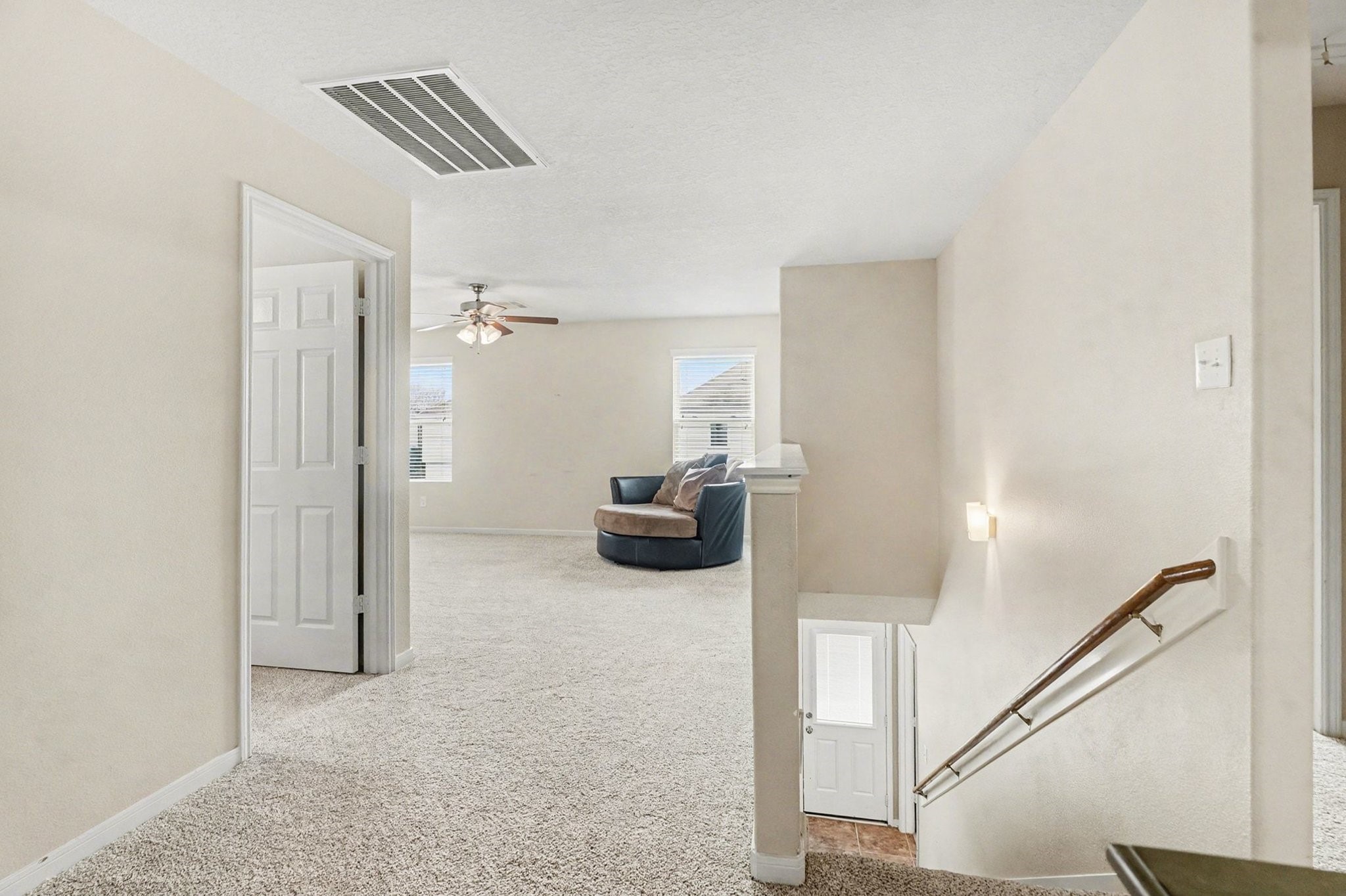 5615 Turmeric Drive Baytown, TX 77521 - Photo 27 of 49 The landing upstairs to the private family living floor