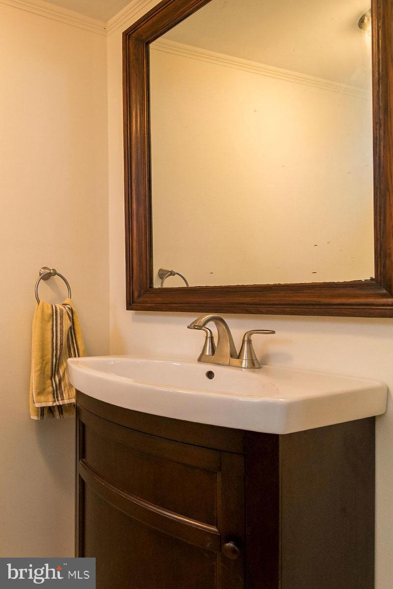 1561 Clairidge Road Baltimore, MD 21207 - Photo 23 of 28 Lower-level Powder Room