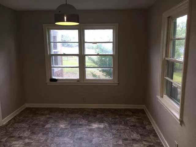 a view of a room with a window