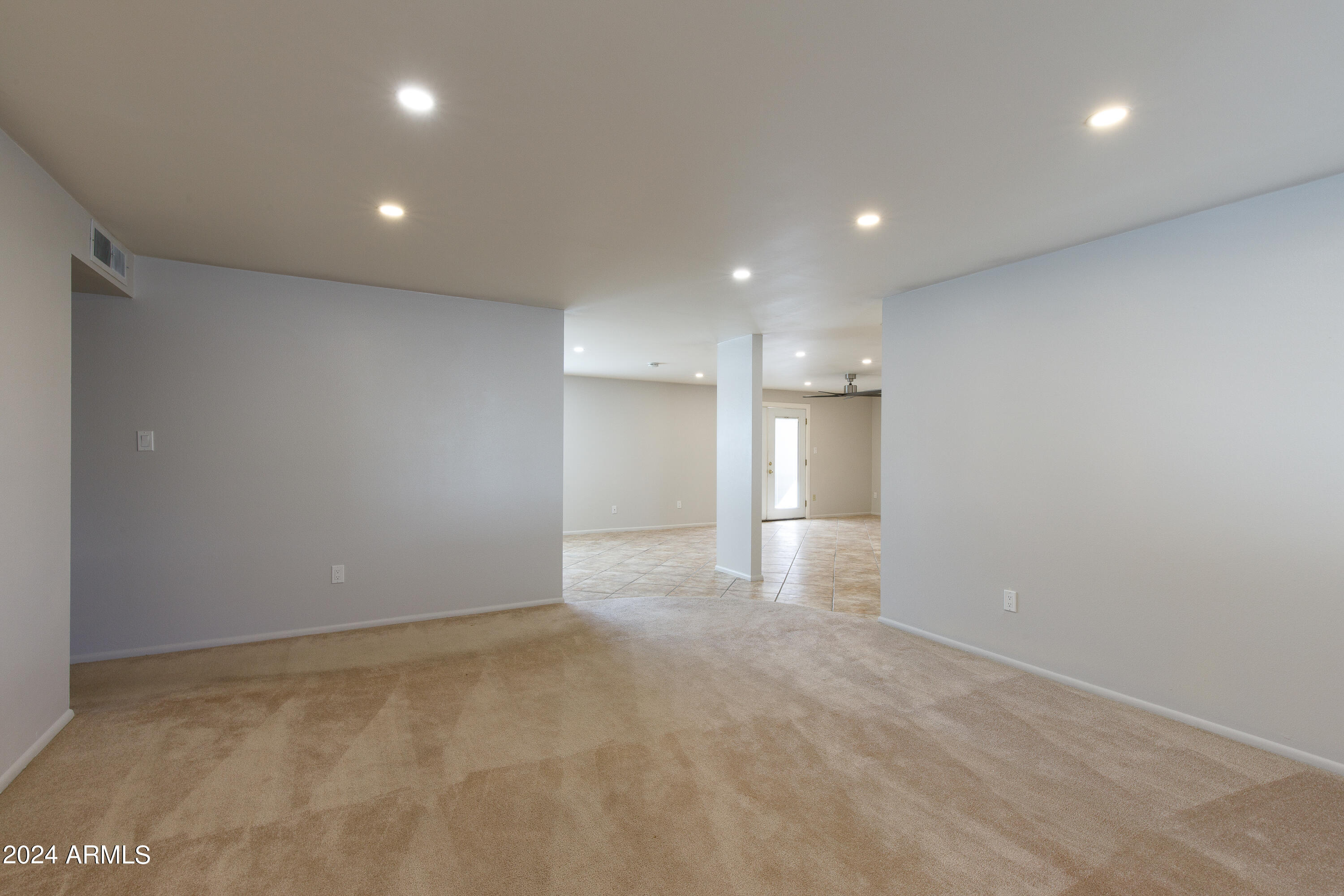 14225 North 39th Way Phoenix, AZ 85032 - Photo 4 of 23 a view of an empty room