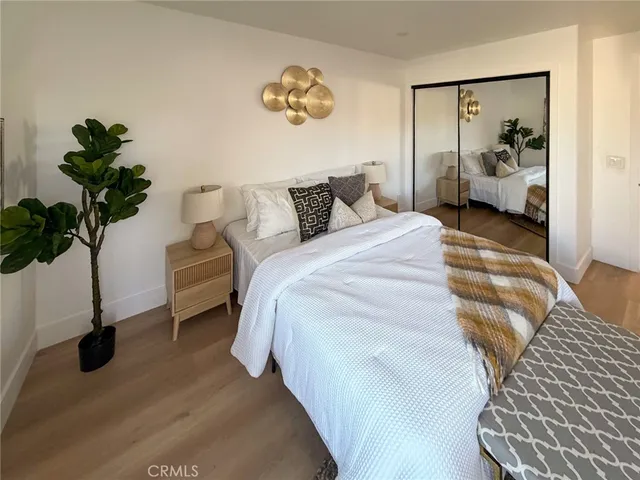 a view of a balcony with wooden floor