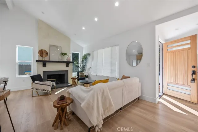 a bed room with furniture and a fireplace