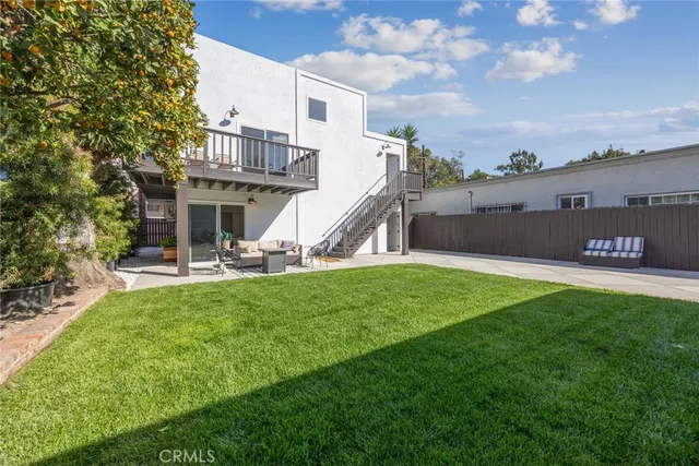 a house view with a garden space