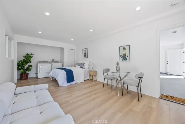 a bedroom with a bed and furniture