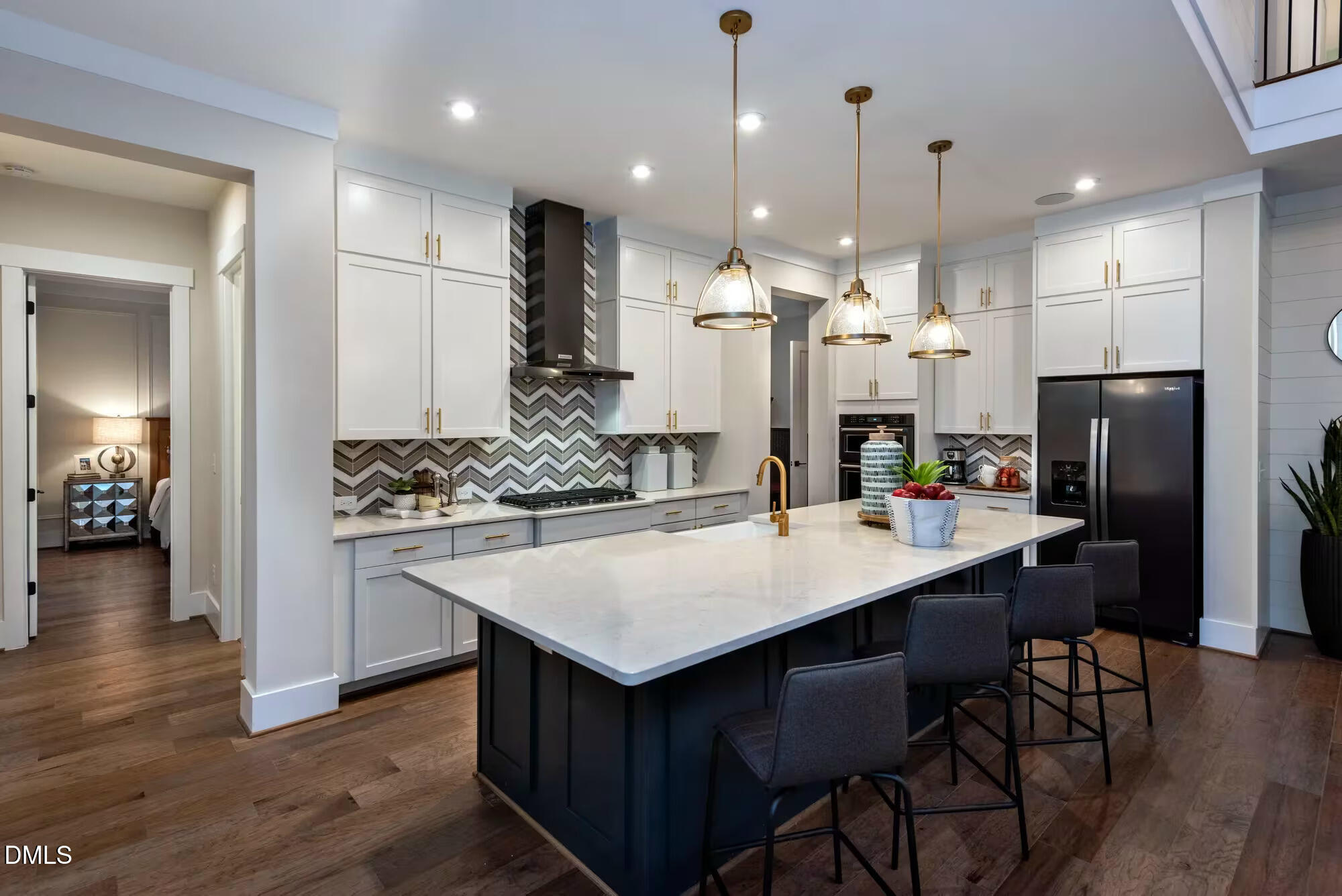 6 Conner Rdg Road Efland, NC 27243 - Photo 3 of 14 a kitchen with stainless steel appliances kitchen island granite countertop a stove a refrigerator a oven a sink a dining table and chairs