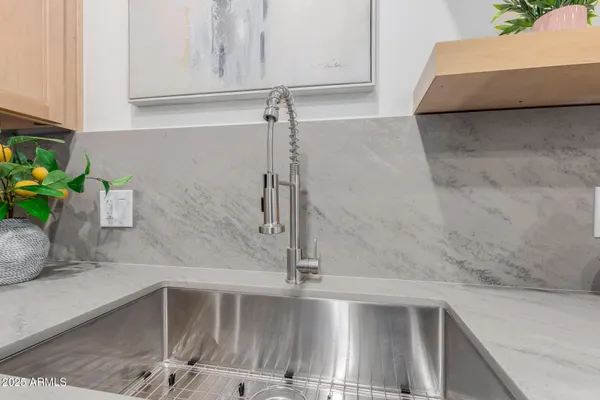 a vase of flowers sitting on a table