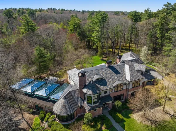 an aerial view of a house with garden