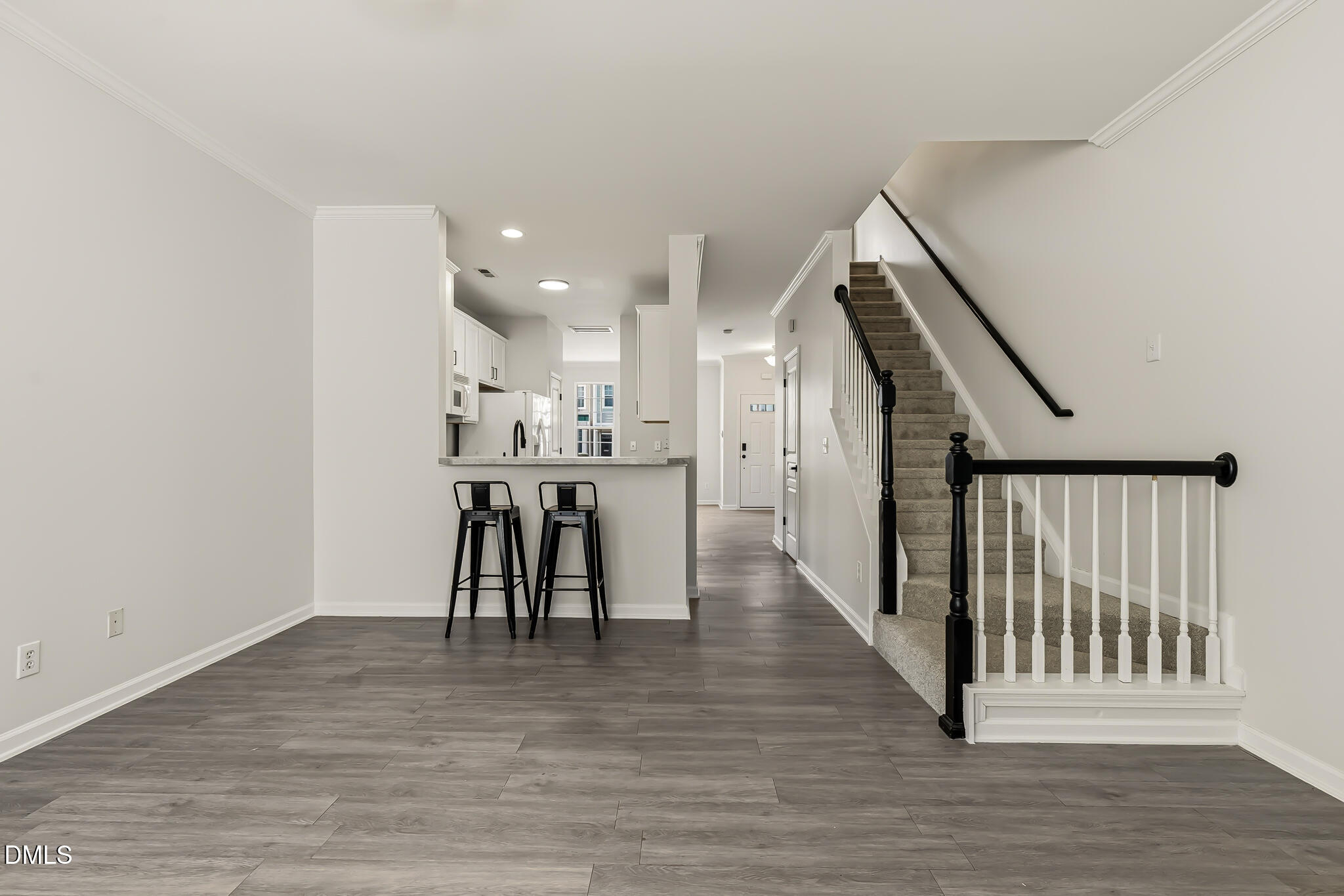 4536 Sugarbend Way Raleigh, NC 27606 - Photo 29 of 45 Living Room and Stairs
