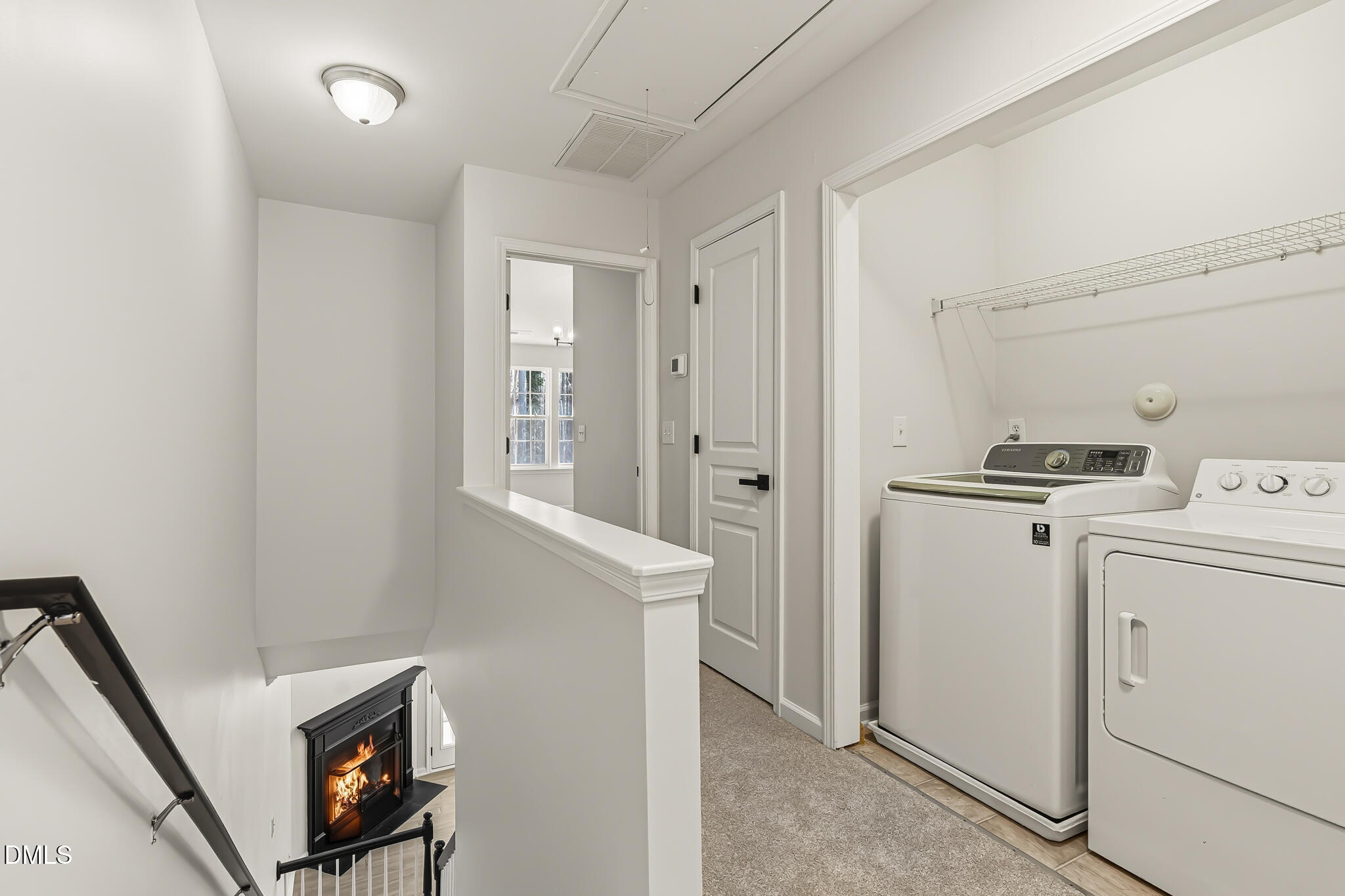 4536 Sugarbend Way Raleigh, NC 27606 - Photo 31 of 45 Upstairs Hall and Laundry Room