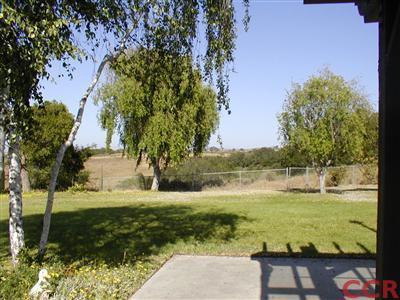 5780 Robin Court Santa Maria, CA 93455 - Photo 5 of 15 a view of a lake with a big yard