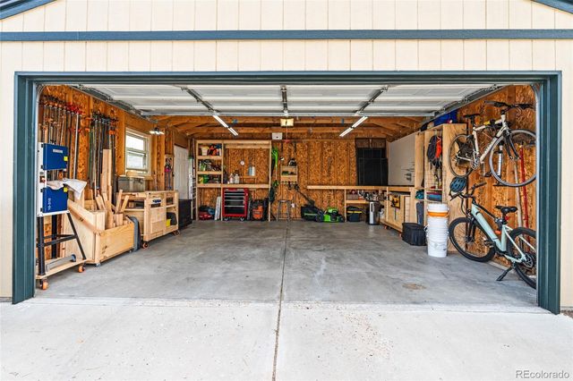 a backyard of a house with outdoor seating