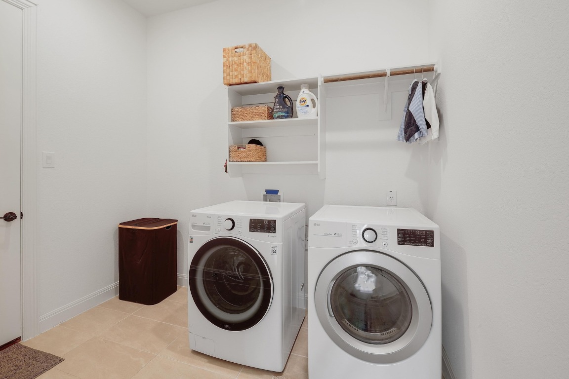 100 Garden Rose Pass Georgetown, TX 78628 - Photo 36 of 39 a utility room with dryer and washer