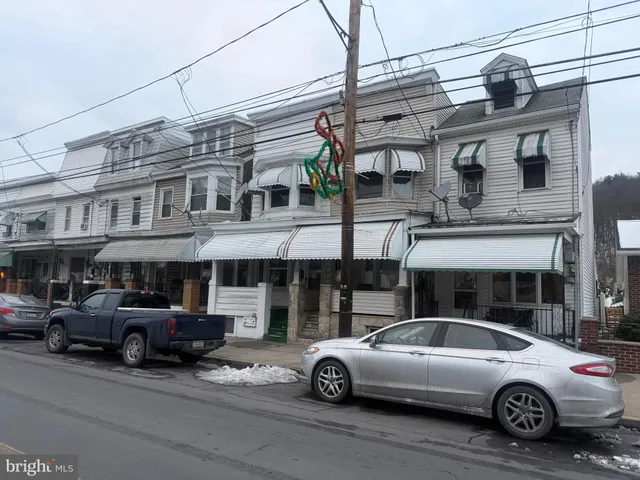 a car parked in front of a building