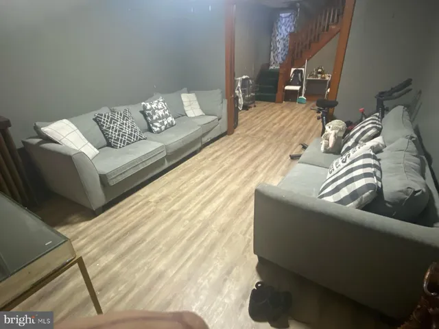 a living room with furniture and a couch
