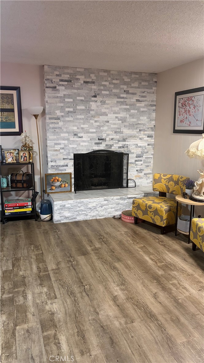 646 El Rancho Drive El Cajon, CA 92019 - Photo 3 of 23 a view of a livingroom with furniture and a fireplace