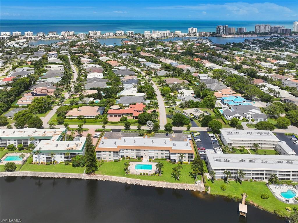 3100 Binnacle Drive, Unit 305 Naples, FL 34103 - Photo 2 of 12 an aerial view of a city
