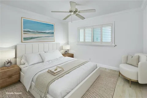 a bedroom with a bed and a couch