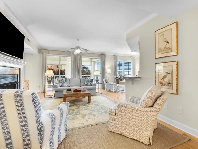 a kitchen with stainless steel appliances granite countertop a refrigerator a stove and a sink