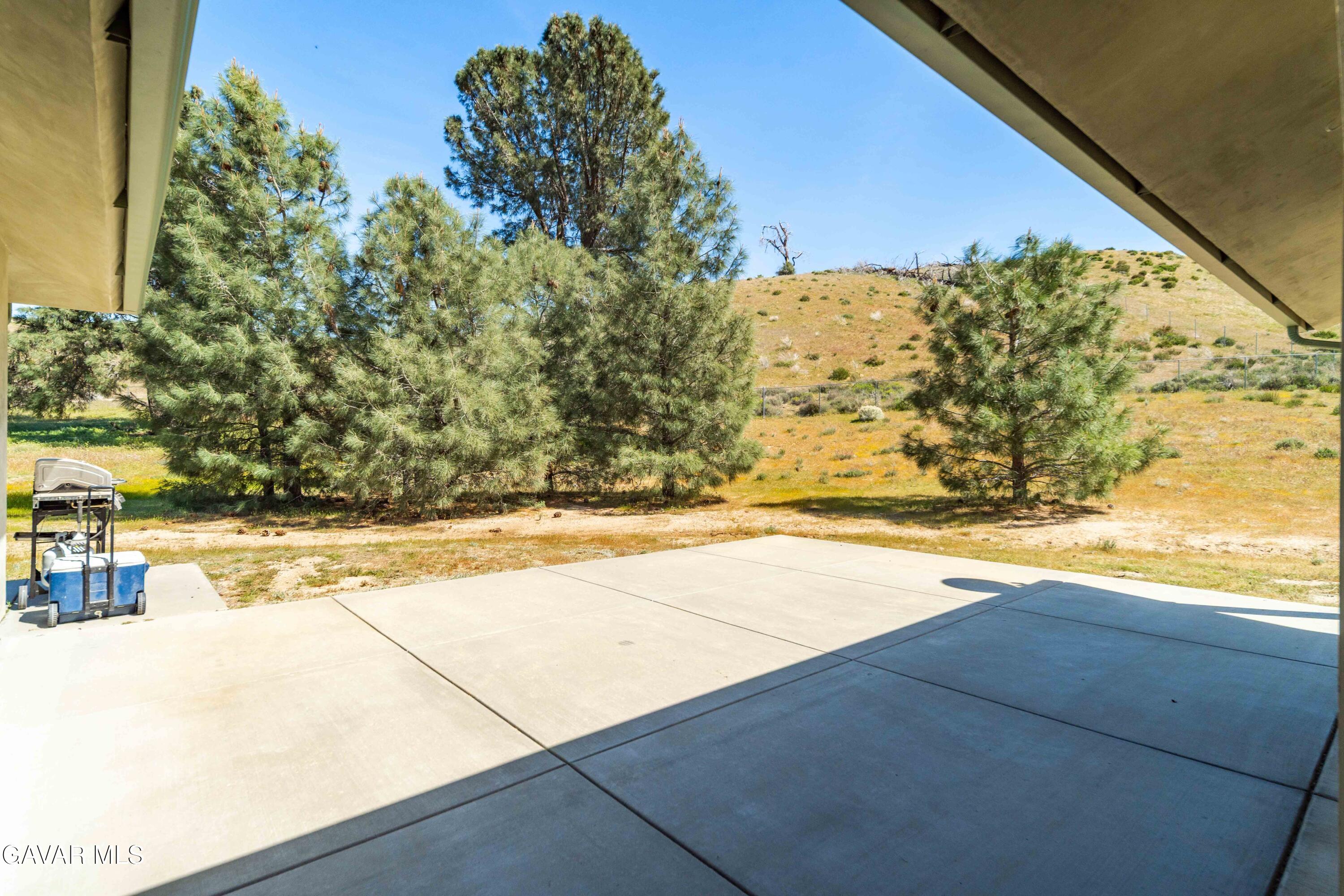 46472 Kings Canyon Road Lancaster, CA 93536 - Photo 27 of 33 a view of swimming pool with an outdoor seating