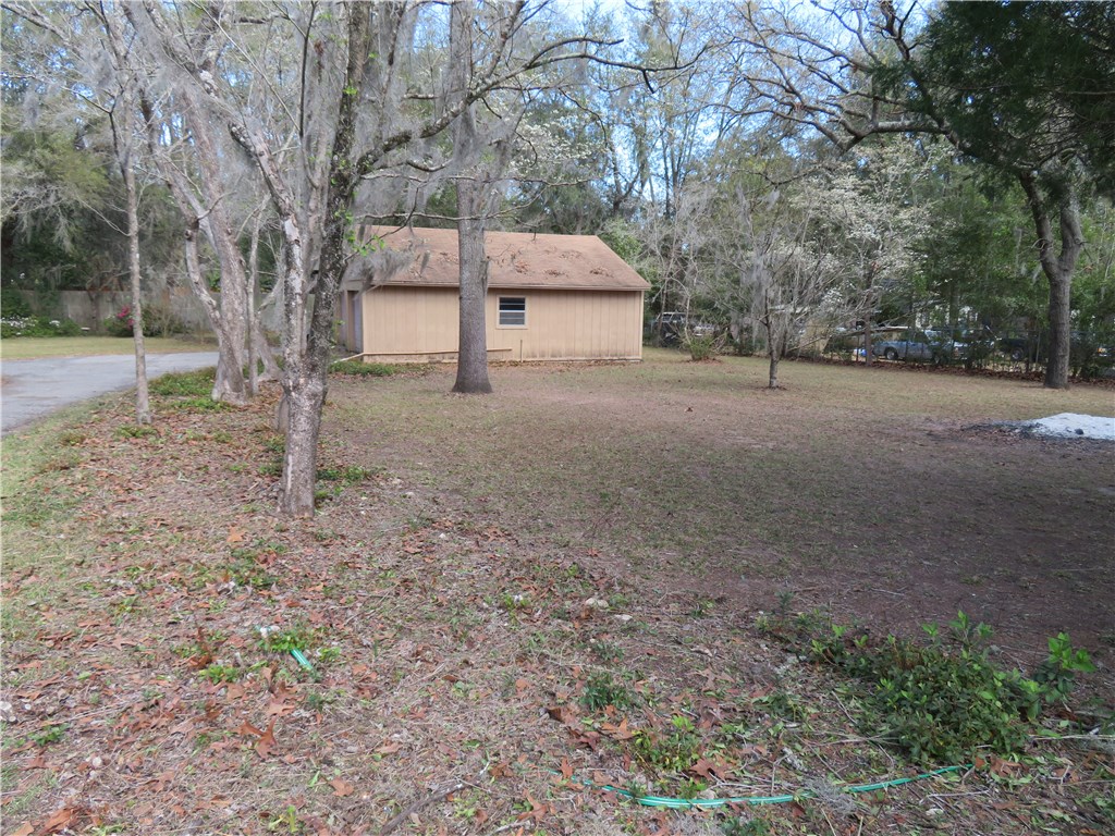 86088 Timber Ridge Street Yulee, FL 32097 - Photo 15 of 21 View of 2 car garage from gate