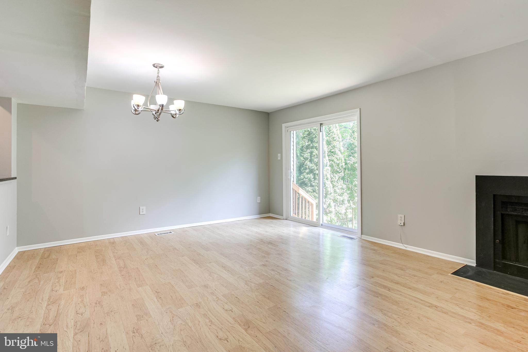 9466 Clocktower Lane Columbia, MD 21046 - Photo 2 of 44 Spacious great room with sliders to backyard