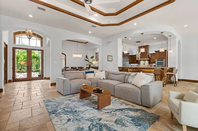 a front view of house with yard and outdoor seating