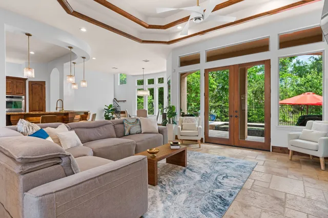 a workspace with wooden floor and windows