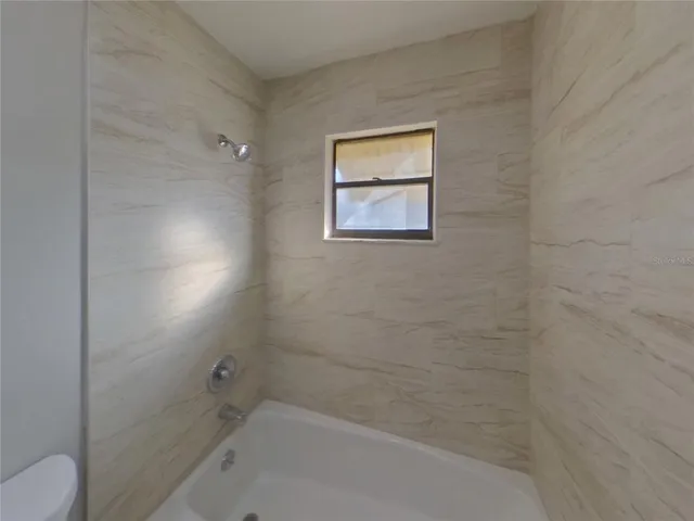a bathroom with a bathtub