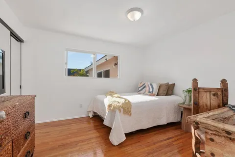 a bathroom with a sink mirror and toilet