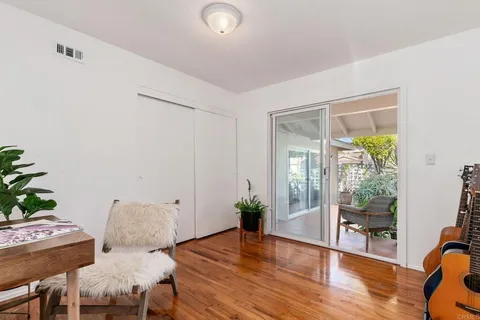 a view of a swimming pool with chairs