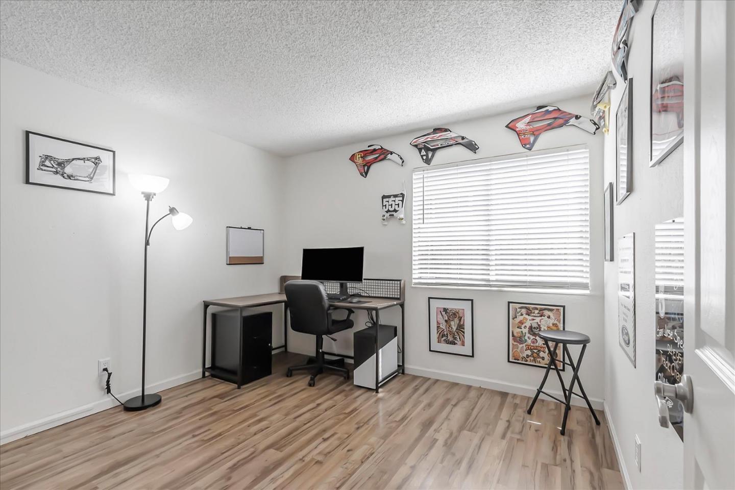 5075 Eppling Lane San Jose, CA 95111 - Photo 19 of 60 a view of a livingroom with workspace and a window